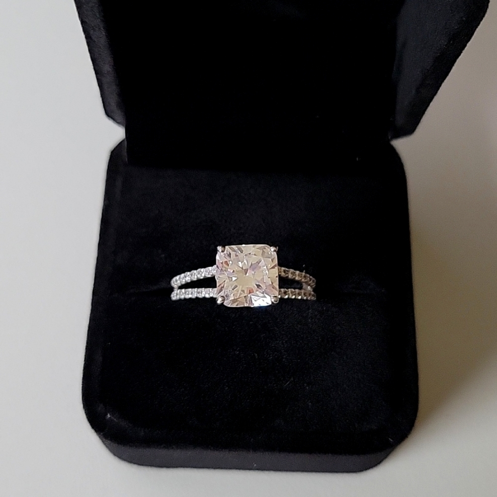 Diamonique platinum clad split shank ring, size 8.